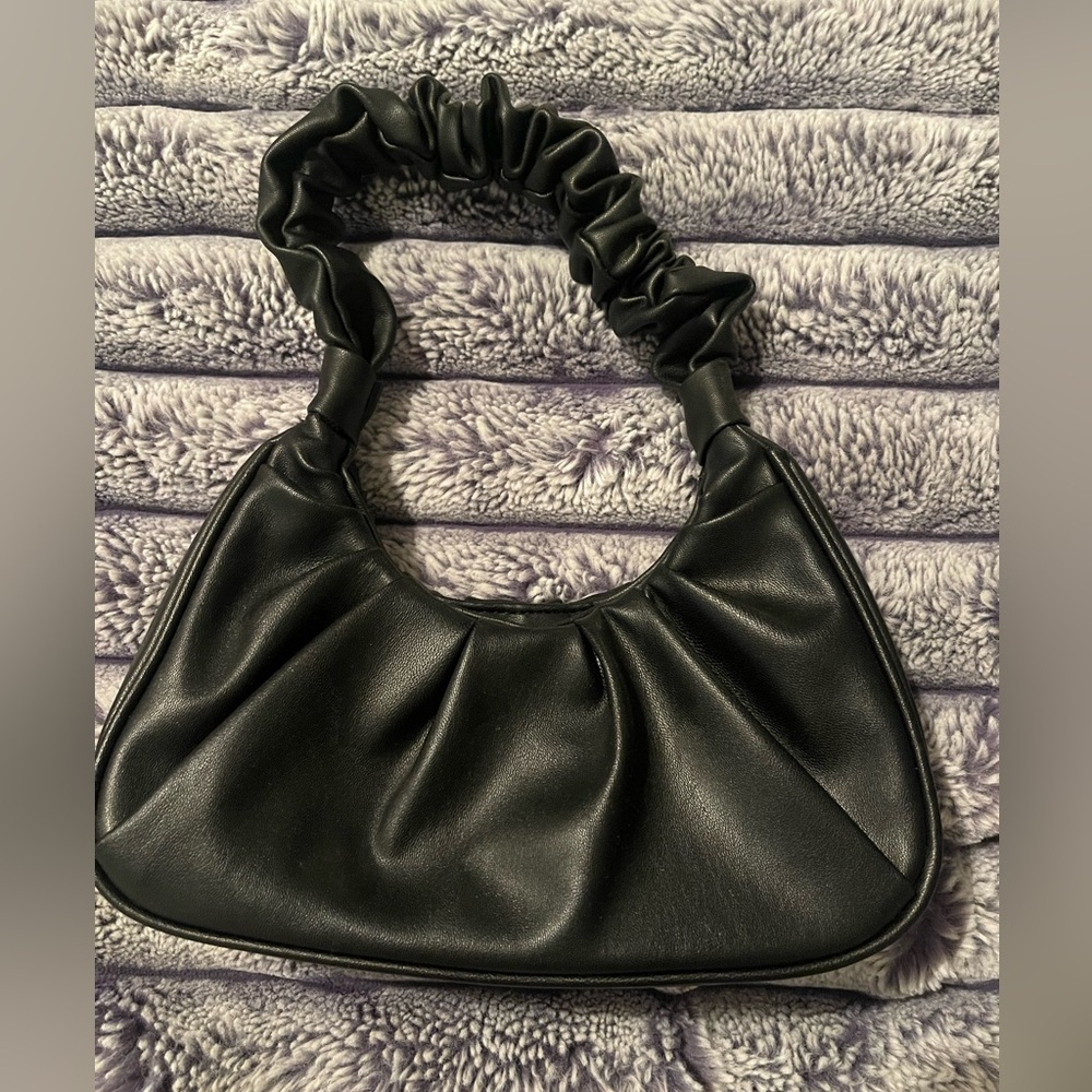SMALL BLACK PURSE, BUTTON OPEN